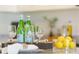 Stylish kitchen detail showcasing wine glasses and lemons on the counter at 700 Preston Cove Dr, St Cloud, FL 34771
