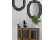 Entryway with modern console table, mirrors, and stylish decor at 700 Preston Cove Dr, St Cloud, FL 34771