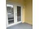 Exterior view showing double doors and a small patio at 934 Lake Destiny Rd # D, Altamonte Springs, FL 32714