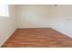 Bedroom with laminate wood floors and a double door closet at 934 Lake Destiny Rd # D, Altamonte Springs, FL 32714