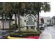 Entrance to Destiny Springs Condominiums with lush landscaping and parking at 934 Lake Destiny Rd # D, Altamonte Springs, FL 32714