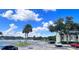Parking area with lake and community building view at 934 Lake Destiny Rd # D, Altamonte Springs, FL 32714