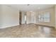 Bright living room with tile floors and lots of natural light at 1100 Charming St, Maitland, FL 32751