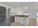 Kitchen boasting stainless steel appliances and granite countertops at 14646 Brightwell Ct, Orlando, FL 32824