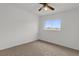 Spacious bedroom with ceiling fan and window at 14646 Brightwell Ct, Orlando, FL 32824