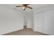 Bedroom with ceiling fan and door to closet at 14646 Brightwell Ct, Orlando, FL 32824