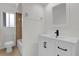 Clean bathroom with white vanity, black fixtures, and shower/tub combo at 14646 Brightwell Ct, Orlando, FL 32824