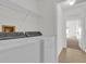 Laundry room with washer, dryer and shelving at 14646 Brightwell Ct, Orlando, FL 32824