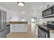 View of kitchen with stainless steel appliances and granite counters at 14646 Brightwell Ct, Orlando, FL 32824