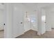 Upstairs hallway with neutral decor and light at 14646 Brightwell Ct, Orlando, FL 32824