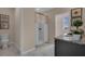 Bathroom with a shower, toilet and vanity with granite countertop at 2626 Sage Valley Way, Winter Haven, FL 33884