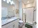 Bathroom features granite countertop, shower, and toilet at 3053 Gatsby St, Kissimmee, FL 34746