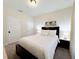 Well-lit bedroom with a queen bed and ample closet space at 3053 Gatsby St, Kissimmee, FL 34746