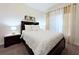 Bright bedroom with a comfortable double bed and nightstands at 3053 Gatsby St, Kissimmee, FL 34746