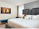 King-size bed, plush bedding, and a teal bench in a spacious bedroom at 3053 Gatsby St, Kissimmee, FL 34746