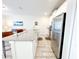 Modern kitchen with stainless steel appliances and granite countertops at 3053 Gatsby St, Kissimmee, FL 34746