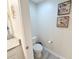 Clean powder room with neutral colors and tile flooring at 3053 Gatsby St, Kissimmee, FL 34746