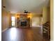 Spacious living room featuring a stone fireplace and hardwood floors at 5003 Shelley Ct, Lakeland, FL 33805