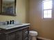 Bathroom boasts marble vanity and updated fixtures at 5003 Shelley Ct, Lakeland, FL 33805