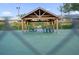 Community picnic pavilion with shaded seating at 604 Kenwick Cir # 202, Casselberry, FL 32707