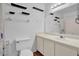 Bright bathroom with vanity, toilet, and shower/tub combination at 604 Kenwick Cir # 202, Casselberry, FL 32707