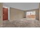 Bright living room with balcony access at 604 Kenwick Cir # 202, Casselberry, FL 32707