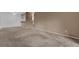 Dining area with carpet and kitchen access at 604 Kenwick Cir # 202, Casselberry, FL 32707