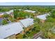 Aerial view of apartment community with pool and lush landscaping at 604 Kenwick Cir # 202, Casselberry, FL 32707