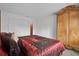 Large bedroom with a king-size bed and ample closet space at 604 Kenwick Cir # 202, Casselberry, FL 32707