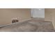 Living room with carpet and wall decor at 604 Kenwick Cir # 202, Casselberry, FL 32707
