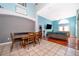 Spacious dining area with hardwood floors and Gathering room access at 709 Lake Emerald Ave, Orange City, FL 32763