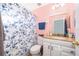 Clean bathroom with shower/tub combo, vanity, and updated fixtures at 709 Lake Emerald Ave, Orange City, FL 32763
