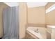 Relaxing bathroom featuring a corner soaking tub and shower at 709 Lake Emerald Ave, Orange City, FL 32763