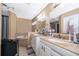 Elegant bathroom with double vanity, soaking tub, and updated fixtures at 709 Lake Emerald Ave, Orange City, FL 32763