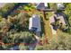 Aerial view showing house, pool, and large lot size at 709 Lake Emerald Ave, Orange City, FL 32763