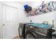 Laundry room with side-by-side washer and dryer, and overhead storage at 709 Lake Emerald Ave, Orange City, FL 32763