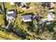 Aerial view of property showing house and surrounding area at 709 Lake Emerald Ave, Orange City, FL 32763