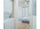 Stackable washer and dryer in a small laundry room at 121 Palermo St, Davenport, FL 33897