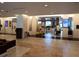 Spacious community lobby with seating and Christmas tree at 14501 Grove Resort Ave # 2122, Winter Garden, FL 34787