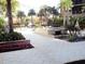 Relaxing community courtyard with fountains and tropical landscaping at 14501 Grove Resort Ave # 2122, Winter Garden, FL 34787