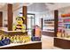 Gift shop with various items and a large bee plushie at 14501 Grove Resort Ave # 2122, Winter Garden, FL 34787