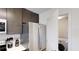 Convenient in-unit laundry with washer and dryer at 14501 Grove Resort Ave # 2122, Winter Garden, FL 34787