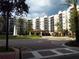Luxury condo building with fountain and ample parking at 14501 Grove Resort Ave # 2122, Winter Garden, FL 34787