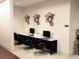 Business center with computers and comfortable seating at 14501 Grove Resort Ave # 2122, Winter Garden, FL 34787