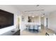 Open concept dining area with seating for four and a view into the kitchen at 14501 Grove Resort Ave # 2122, Winter Garden, FL 34787