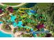 Aerial view of a vibrant water park with slides and pools at 14501 Grove Resort Ave # 2122, Winter Garden, FL 34787