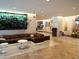 Lobby with comfortable seating and a green wall feature at 14501 Grove Resort Ave # 2122, Winter Garden, FL 34787