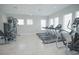 Well-equipped fitness center featuring treadmills and other exercise machines at 15877 Tollington Aly, Winter Garden, FL 34787