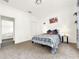 Bright bedroom with a double bed and carpet floors at 2387 Laurel Blossom Cir, Ocoee, FL 34761