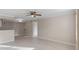 Bright living room with tile floors and ceiling fan at 3012 Parkway Blvd # 102, Kissimmee, FL 34747